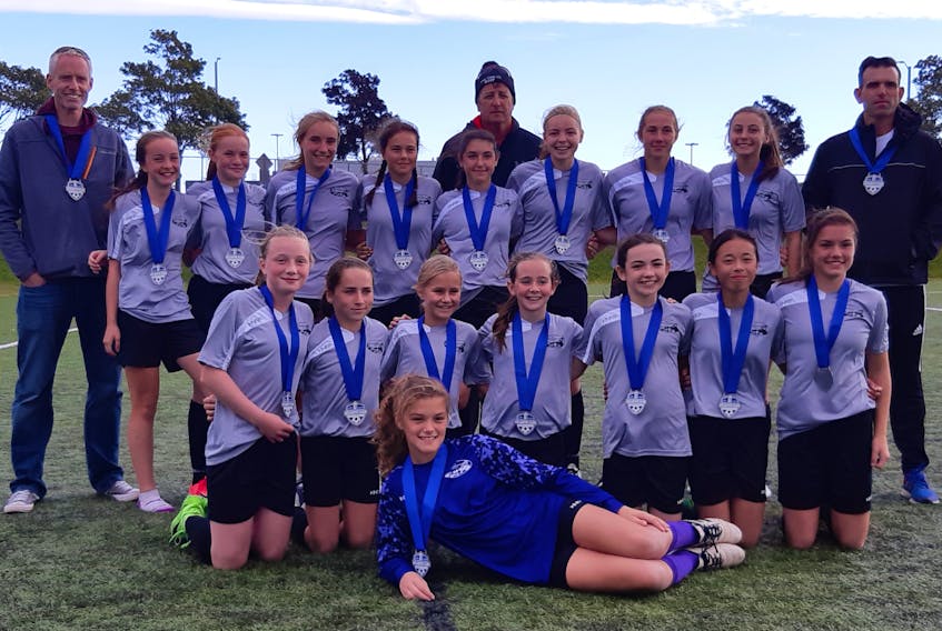 The Prince County team collected the silver medal at the under-13 girls Atlantic club soccer championship in Charlottetown on Sunday. Team members are Maddy MacPherson, lying in front, and kneeling, from left: Olivia James, Bree McAlduff, Annie-Pier Morency, Ava Pomeroy, Kristyn Taylor, Lana Gillis and Kailyn Gallant. Third row: Ardyn Hardy, Jorja Shields, Maleah Welton, Aaliyah MacDonald, Skyla Jeffery, Amelia Murphy, Maddy Keough, Ella Donovan and DJ Welton (assistant coach). Back row: Ian Gillis (assistant coach) and Blair Murphy (head coach).