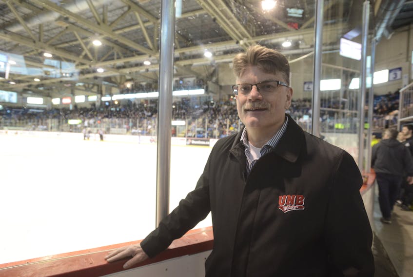 UNB Reds head coach Gardiner MacDougall attended a Quebec Major Junior Hockey League playoff game between the Charlottetown Islanders and Cape Breton Screaming Eagles at Eastlink Centre in Charlottetown on March 22, less than a week after winning the national men’s university hockey championship.