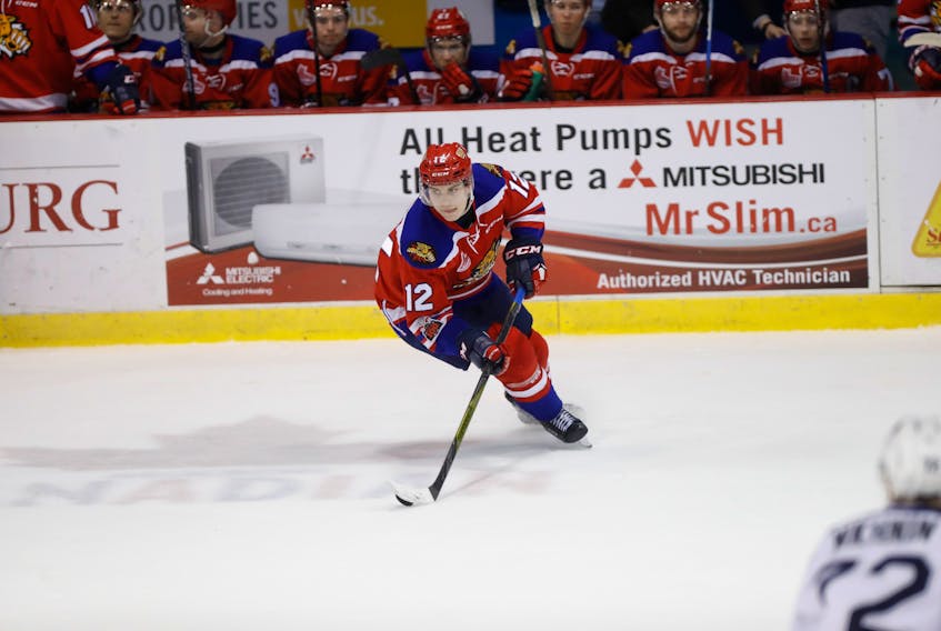 Jeremy McKenna of Summerside controls the puck for the Moncton Wildcats.