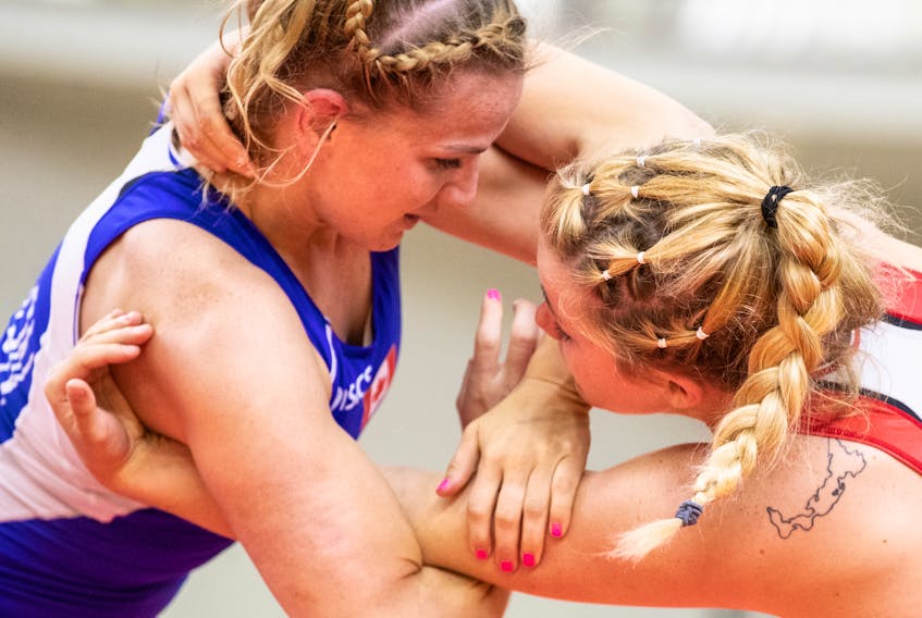 Hannah Taylor, right, competes against Hannah Franson at the  Canada Cup international wrestling event in Guelph, Ont., in July. Wrestling Canada/Michael P. Hall