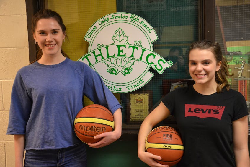 Grade 12 students Haley Brennan, left, and Georgie McKenna of the host Three Oaks Axewomen are looking forward to this weekend’s Sweetheart basketball tournament at the Summerside high school.