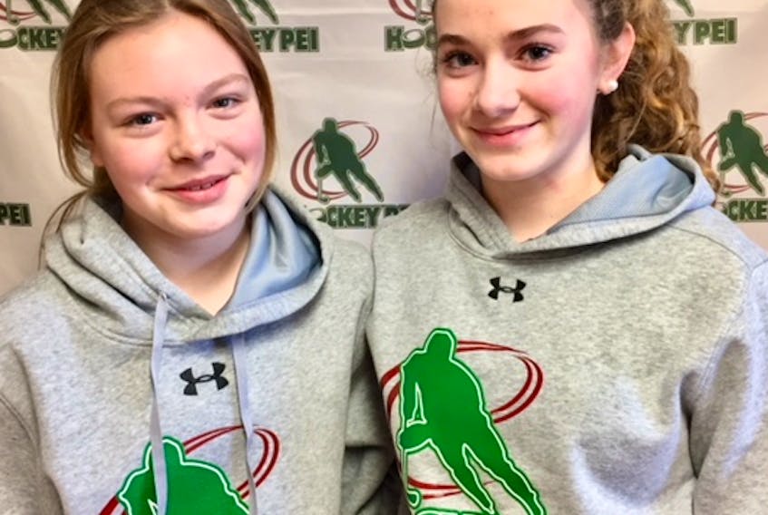 Rachel Richards, left, and Emma Dyer will represent Hockey P.E.I. at the 2018 IIHF Global Girls’ Game in Toronto on March 11.