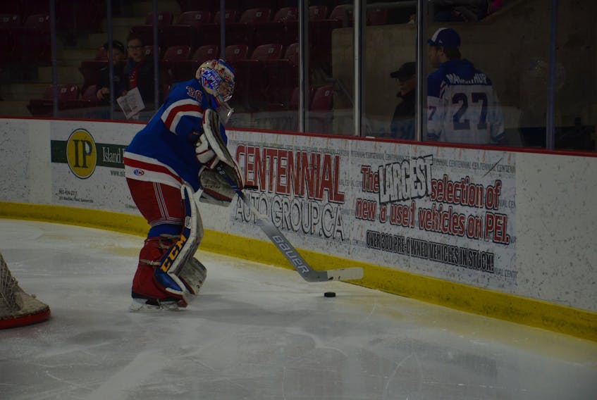 Summerside Western Capitals Dominik Tmej plays the puck behind the net during first-period action of Tuesday night’s MHL (Maritime Junior Hockey League) game against the Grand Falls Rapids at Eastlink Arena. Tmej earned his league-leading sixth shutout in the Caps’ 8-0 win.