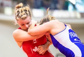 Hannah Taylor, left, competes against Hannah Franson at the Canada Cup international wrestling event in Guelph, Ont., last weekend. Wrestling Canada/Michael P. Hall
