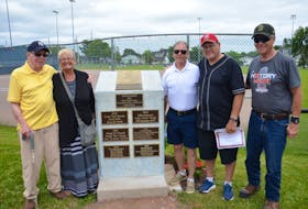 The Legends Field Honour Roll induction ceremony was held at Queen Elizabeth Park in Summerside on Saturday afternoon. Inductees were, from left: Gerard Dalton; Linda MacNeill, representing her husband, George MacNeill; Kenny St. John, representing his father, Frank St. John, who was a member of the 1951 Holman’s intermediate team; Greg MacDonald, and Roger Ahern, representing the late Johnny Carroll.