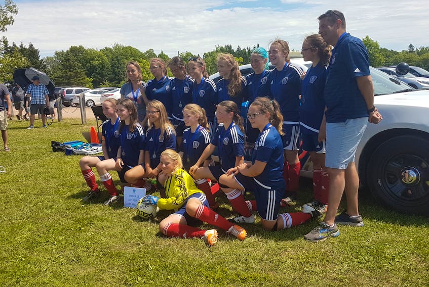 The Summerside United under-13 girls’ First Division team earned a silver medal at the Winsloe/Charlottetown FC soccer tournament on Sunday. Fundy Soccer edged Summerside 1-0 in the championship game. Members of the United are keeper Sydney Cormier, in front, and kneeling, from left: Mya Goeseels, Elizabeth Smith, Taia Gallant, Lauren Mintie, Katie-Grace Noye and Dru Gillis. Back row: Michelle Gallant (manager), Allie Simpson, Kennah Brant, Avery Kerwin, Alexandra MacCaull, Aurora MacAusland, Sydney Cameron, Jaelynn Oatway and Jeff Brant (coach).