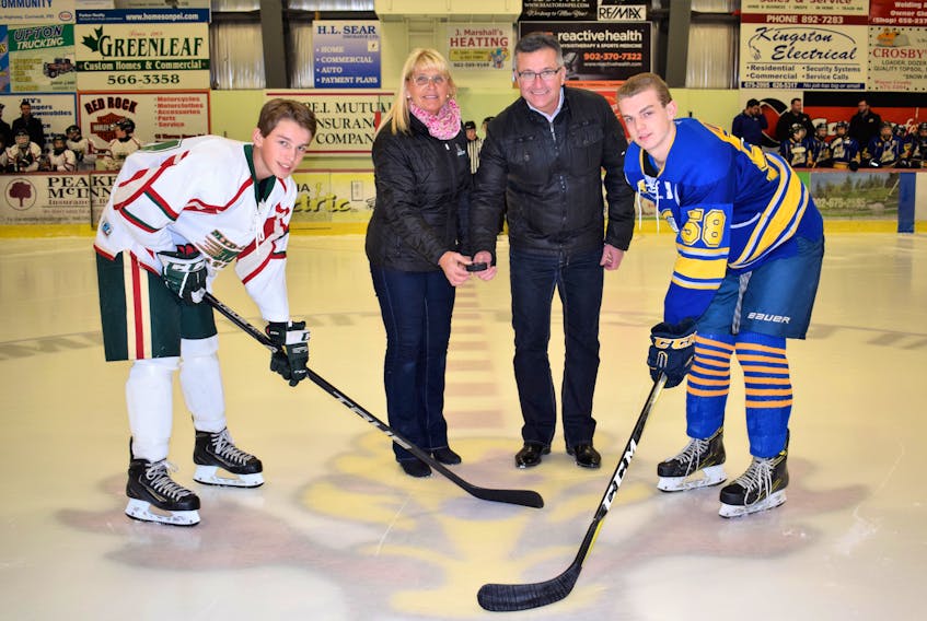 The Prince County Warriors visited the Mid-Isle Matrix in the opening game of the P.E.I. Major Bantam AAA Hockey League regular season at the APM Centre in Cornwall on Tuesday night. Mid-Isle Matrix captain Carson MacKay, left, and Zach Biggar, captain of the Prince County Warriors, take the ceremonial faceoff. League co-ordinator Sandra Jamieson and Heath MacDonald, minister of economic development and tourism drop the puck. The Warriors won the game 6-3.