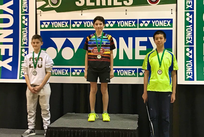 Spencer Gallant, centre, of P.E.I. finished first in under-15 boys’ singles at the Yonex Guy Martin badminton tournament in Moncton, N.B., recently. New Brunswick’s Benjamin Culligan, left, finished second and Junming Feng of P.E.I. was third.