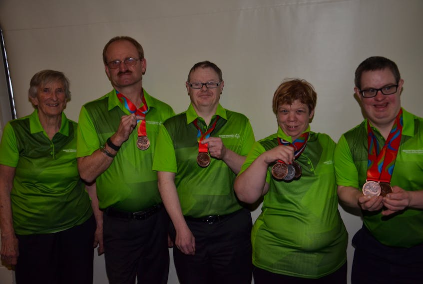 Team P.E.I.’s tenpin team was presented with the bronze medal from the Division 3 team competition at the Special Olympics Canada 2018 bowling championships at Credit Union Place in Summerside on Saturday morning. Team members are, from left: Ann Kilby (coach), Wayne Dyment, Kevin Ramsay, Jenna Smith and Paul Phillips. Smith and Phillips also earned medals in individual competition.