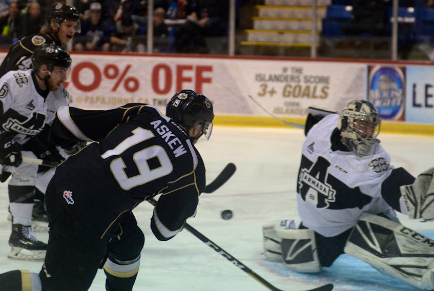 Blainville-Boisbriand Armada goalie Emile Samson stops Charlottetown Islanders right-winger Cam Askew during the first period action Tuesday at the Eastlink Centre.