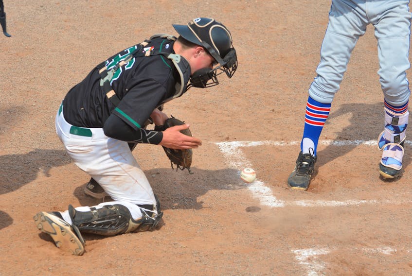 P.E.I. Youth Selects catcher Duncan Picketts attempts to block a pitch in the dirt during action against the Nova Scotia Selects on Monday. Nova Scotia swept an exhibition doubleheader played at Queen Elizabeth Park’s Legends Field.