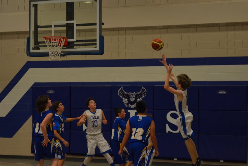 Nick Blanchard of the Summerside Intermediate School (SIS) Owls releases a shot during a game against Stonepark in the 41st annual SIS tip-off basketball tournament on Saturday afternoon.