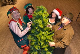 Searching for the mistletoe are cast members of Mill River Resort’s ‘Murder Under the Mistletoe’ dinner theatre, clockwise from left, Mike Ford, Chad Matthews, Lisa Dawn Fitzgerald and Paul Shea. There are 14 shows scheduled between Nov. 21 and Dec. 21.
