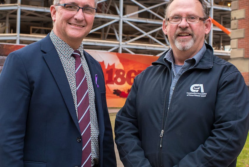 Economic Development and Tourism Minister Heath MacDonald (left) and Sam Sanderson, general manager of the Construction Association of P.E.I. met recently to discuss economic growth numbers in P.E.I.