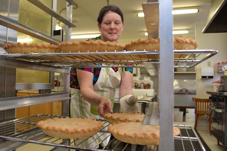 There is something about the aroma of Acadian meat pies that puts many in the Christmas spirit