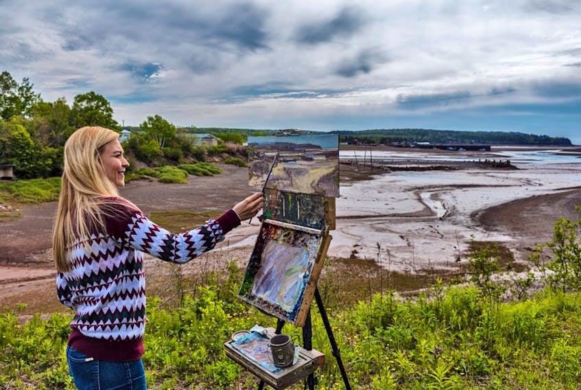 Alison Menke paints Pinky Creek Road during the 2018 Plein Air Festival in Parrsboro. While the 2020 edition of the festival has been cancelled due to COVID-19, Parrsboro Creative is thinking outside the box with a virtual festival called PIPAF In Isolation that will see the 30 selected artists painting in isolation from their studios, vying for more than $6,000 in prize money.