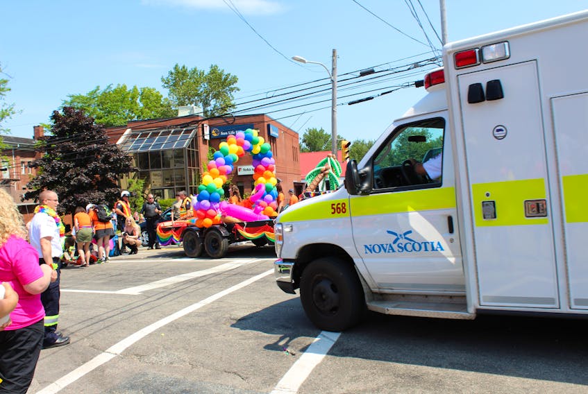 An ambulance is shown arriving at the corner of Dorchester and George streets in Sydney where a young person was struck by a parade float during the 19th annual Pride Cape Breton Parade.
