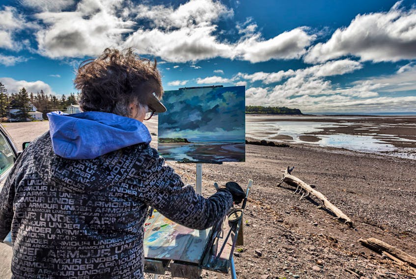 Nancy Tankersley works during 2018’s Parrsboro Plein Air Festival. Her work, Lifting Clouds, featuring Parrsboro harbour was the winner of the competition. This year’s festival is set for June 20 to 23 with 30 painters from across North America coming to the Parrsboro area.