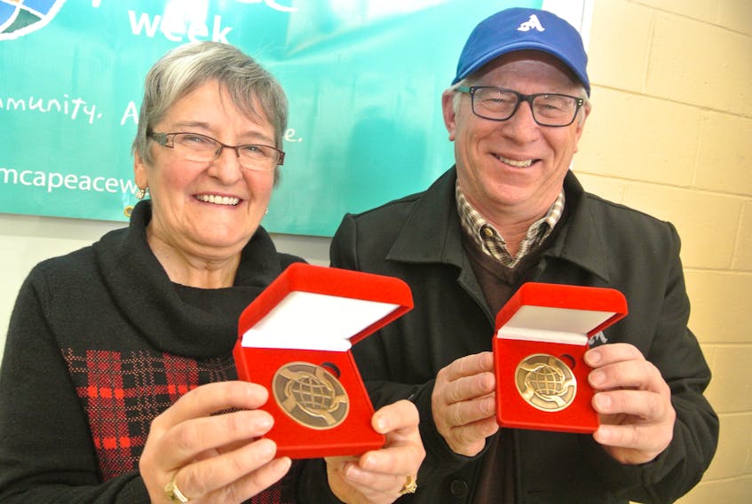 There was a surprise in store for Veronica Richards and Bill Schurman when they visited the Cumberland YMCA Nov. 22. Both were named recipients of the YMCA Peace Medal.