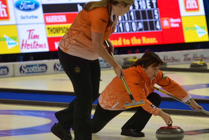 Skip Theresa Breen releases a shot while lead Amanda Simpson is ready to sweep. The action took place during Tuesday afternoon’s game against Shannon Kleibrink at the 2017 Home Hardware Road to the Roar Pre-Trials curling event. Jason Simmonds/Journal Pioneer