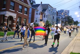 A couple hundred people marched down the streets of Halifax on Monday, July 20, 2020. They chanted the words "Get up, get down, Black lives matter all year round" as part of the Halifax Pride 2020 event.