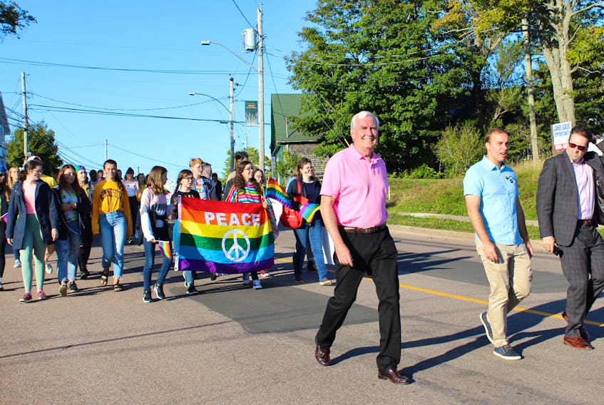 Kevin Vickers, new leader of the New Brunswick Liberal Party, centre, takes part in Sackville’s Pride Parade last Thursday afternoon. Vickers has also participated in Pride Parades in Saint John, Miramichi, Fredericton and Moncton over the past several weeks.