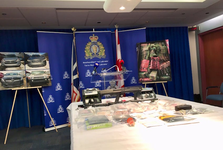 Items, including weapons, drugs and money, seized as part of Project Broken — an investigation into organized crime and drug trafficking — were displayed at RCMP headquarters in St. John’s today.