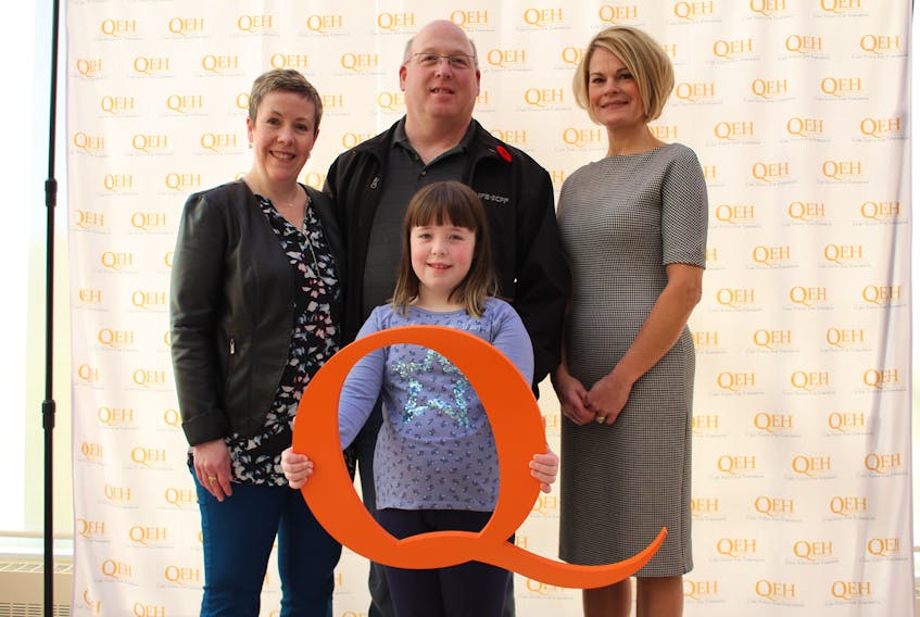 Julie Hambly, right, chairwoman of the Friends for Life campaign, joins Rhonda Lewis and her family for a photo following this year’s campaign launch at the QEH in Charlottetown. Lewis, a stroke survivor and former RN at the QEH, is accompanied by her husband, Chris, and their nine-year-old daughter, Delaney.