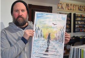 Dennis Ellsworth, lead singer for The Fabulously Rich, a Tragically Hip tribute band, shows a print he purchased during a fundraising campaign for the Gord Downie and Chanie Wenjack Fund. It’s by Jeff Lemire, the same artist who created the “Secret Path” album cover for The Tragically Hip. However, instead of Wenjack walking on the railroad tracks, it’s the late Gord Downie. Ellsworth says the tribute band will continue to support the fund. SALLY COLE/THE GUARDIAN