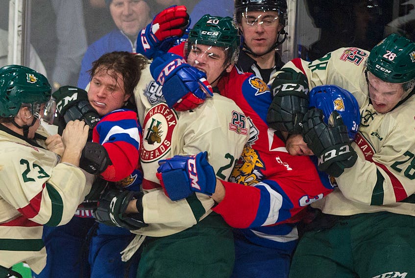 Members of the Halifax Mooseheads and Moncton Wildcats battle during Saturday's QMJHL game at the Scotiabank Centre. (Ryan Taplin/Staff)