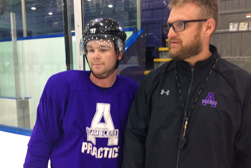 Left-winger Aidan McFarland (left) and Amherst CIBC Wood Gundy Ramblers coach and GM Jeff LeBlanc discuss a drill during a team practice. The Ramblers acquired McFarland a couple of weeks ago and he’s expected to be a key contributor to the club’s run to the Fred Page Cup next May.