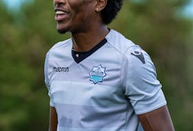 HFX Wanderers captain Andre Rampersad shares a laugh with his teammates during a practice last season. - HFX WANDERERS