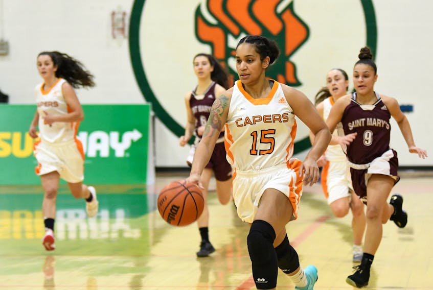 Audrey Rankin of the Cape Breton Capers women’s basketball team carries the ball during Atlantic University Sport action at Sullivan Field House last season.