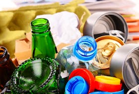 Materials that can be recycled are piled in a recycling container. — 123RF Stock Photo