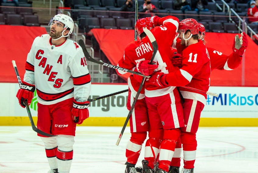 Detroit Red Wings winger Bobby Ryan (54) celebrates with his teammates including linemate Filip Zadina after scoring the opening goal of the game against the Carolina Hurricanes on Saturday night in Detroit. - Eric Bronson / USA TODAY Sports