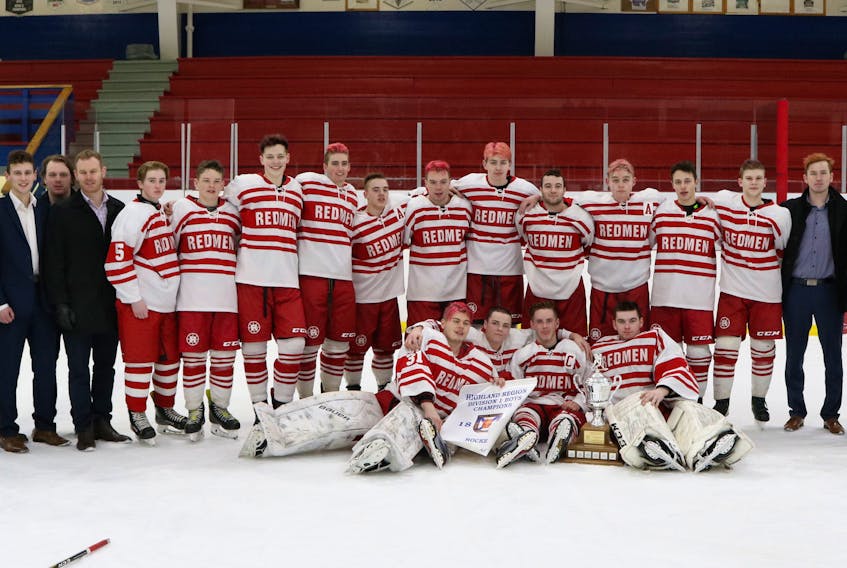 The Riverview Redmen claimed the Highland Region Division 1 boys hockey championship on Feb. 26 with a 2-1 overtime win over the Glace Bay Panthers at the County Recreation Centre in Coxheath. Front row from left are Ryan Tanner, Andrew McCarron, Dylan Mac Donald and Michael MacMullen. Back row from left are Daniel Keough (assistant coach), Brendan Smith, Jared Hunt, Jordon Moss (assistant coach), Steve Jamael (assistant coach), Owen Burke, Coby McCarron, Ethan Stanwick, Trevor Jennings, Brady MacLean, Rory Morrison, Josh MacAskill, Kinnon Williams, Blake Cox, Kendall MacQueen, Chase Sampson, Bryden Johnston, Mike Florian (equipment manager) and Jimmy Smith (head coach). SUBMITTED PHOTO/JEAN STANWICK