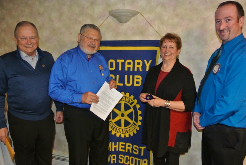 Vicki Daley is the latest recipient of the Amherst Rotary Club’s Paul Harris Community Fellowship Award that is presented annually to a non-Rotarian for the ongoing work in the community. Joining her following Monday’s presentation were: (from left) her husband Blake, Rotarian Morris Haugg and Rotary president David McNairn.