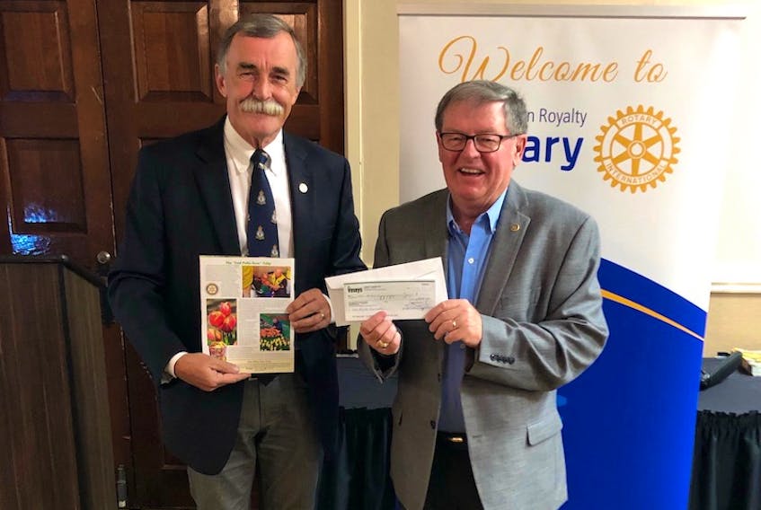 John Barrett (left), Vesey’s Seeds director of sales, marketing and development, presents a cheque for $11,187.25 to Lewie Creed, past-president and foundation chairman of the Rotary Club of Charlottetown Royalty. This cheque represents the net proceeds from the sale of the End Polio Now tulip through the Vesey’s catalogue. Earlier in the month, an additional $33,000 was donated to Rotary by Vesey’s as part of a district-wide Rotary sale of these same tulips. These proceeds will be double matched by the Gates Foundation and assist Rotary in the final stages of world-wide polio eradication.