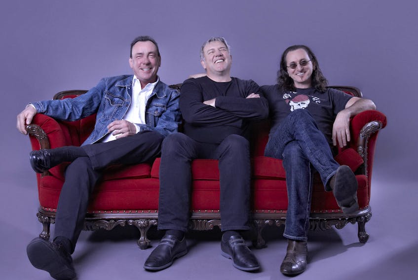 Rock fans nationwide are mourning the loss of Rush drummer Neil Peart (left), shown here with bandmates Alex Lifeson and Geddy Lee in a promotional photo for the Clockwork Angels tour that brought the band to Halifax for the last time in 2013. - Universal Music Canada