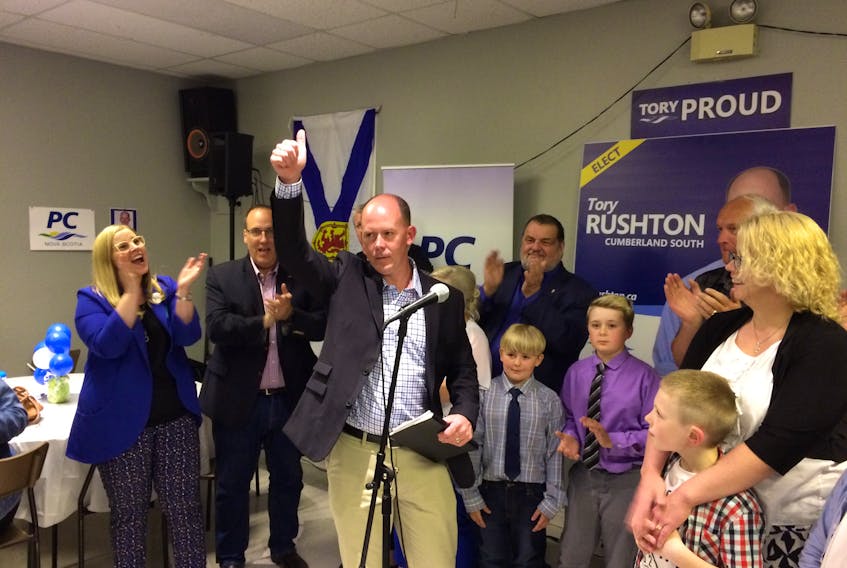 Cumberland South MLA-elect Tory Rushton gives a thumbs up to his supporters in Oxford on Tuesday night. Rushton, 38, was elected the new MLA for Cumberland South and was joined at his election night headquarters by members of his family and the PC caucus.