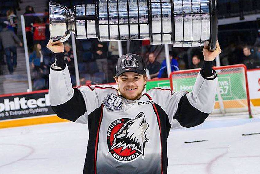 Beaver Meadow, Antigonish County’s Ryan MacLellan hoists the Memorial Cup following his Rouyn-Noranda Huskies’ 4-2 win over the Halifax Mooseheads, May 26. Vincent Éthier /LHJMQ