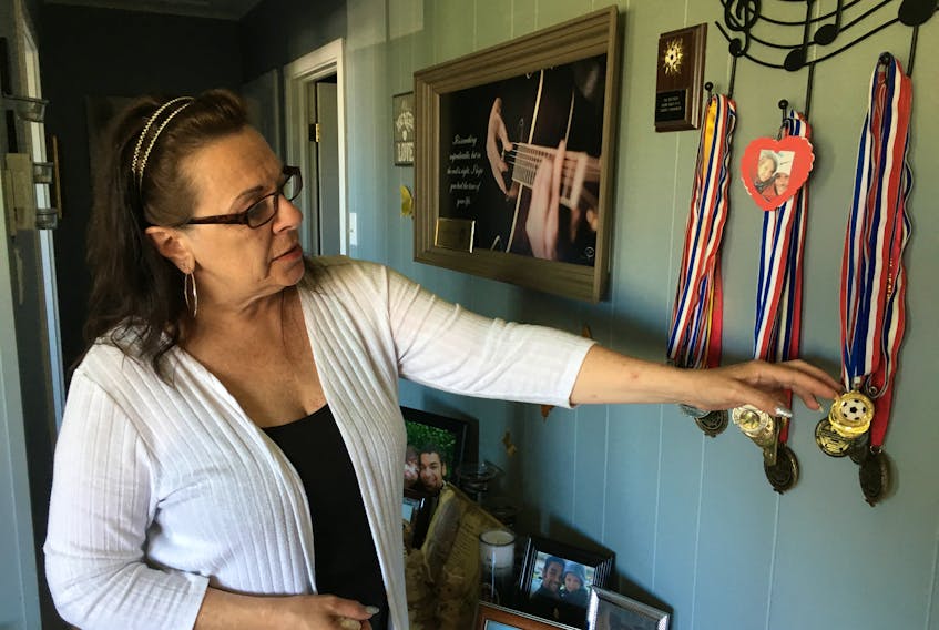 Donna Foote has created a memory wall at her home in Fortune for her son, Jeff Matthews, who died following an altercation at a bar in Medicine Hat, Alta., one year ago Monday.