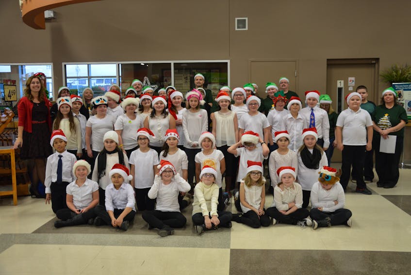 Members of the Grades 4 and 5 choir from Sacred Heart Academy, Sobeys staff and family members performed “The Star of Christmas” at the Sobeys store in Marystown on Nov. 29. Colin Farrell/ The Southern Gazette