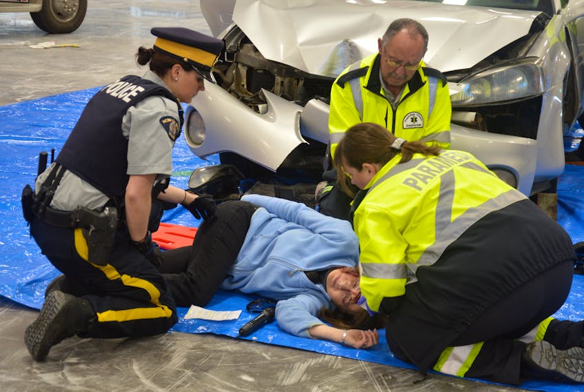 In an attempt to help raise awareness of the dangers of driving while impaired, MADD Burin Peninsula sponsored a mock crash demonstration held at Fortune Arena on May 2. Here first responders act out how they would respond in the event of a serious injury due to a vehicle collision.