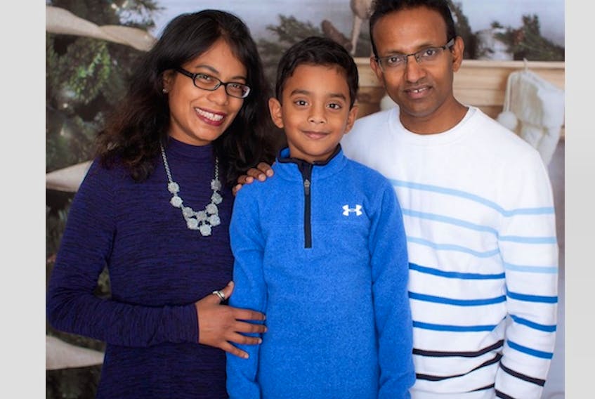 Yalini Sivachandran says she is grateful to the staff of Sacred Heart Academy for putting her concerns about cultural diversity and acceptance at school to rest. From left, Yalini, son Swaran and husband Aravinthan.