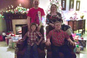 The Hunt Family, Standing (l-r) Rick Hunt and wife Lori. Sitting (l-r) Eight year old Liam Hunt and his brother Ethan Hunt