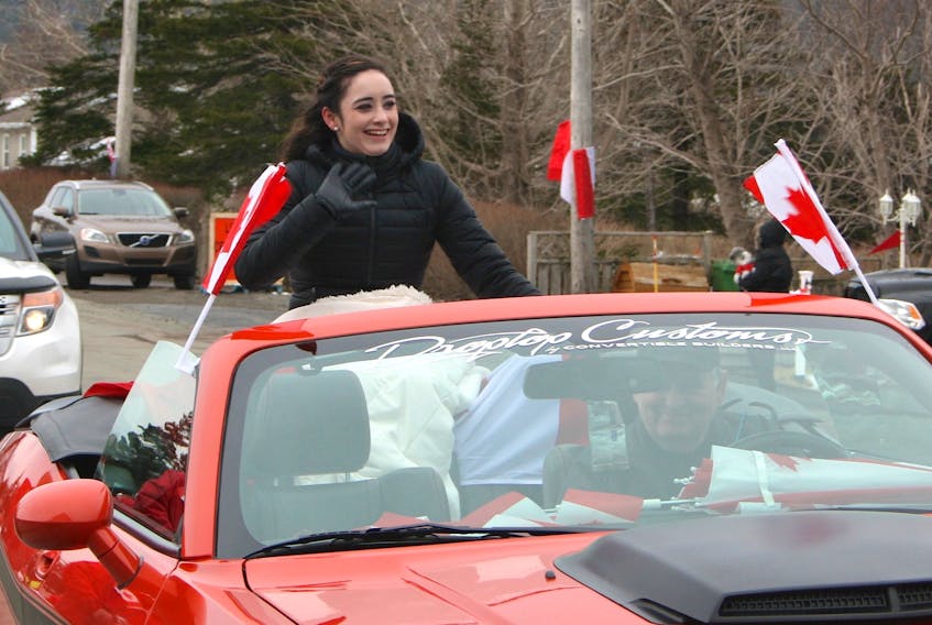 Kaetlyn Osmond smiles and waves as she arrives at St. Gabriel’s Hall at the conclusion of Saturday’s parade in her honour. - Paul Herridge