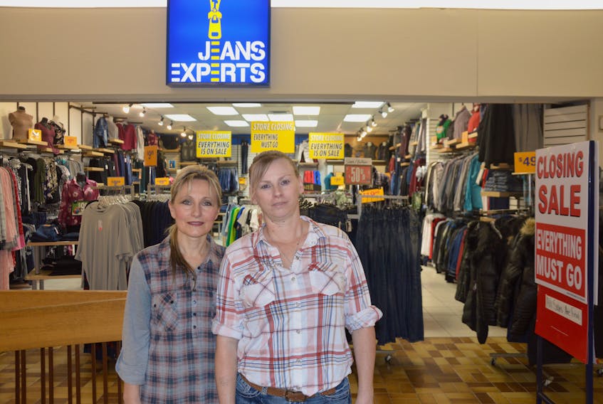 Gail Smith is sad to see the Jeans Experts location in Marystown close. Smith, the store manager and long-time employee, is joined in the photo by co-worker Yvonne Slaney.