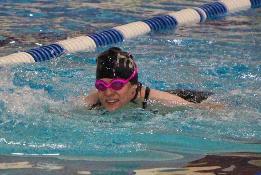 Elizabeth Adler, swimming at the 2018 Special Olympics Summer Games.