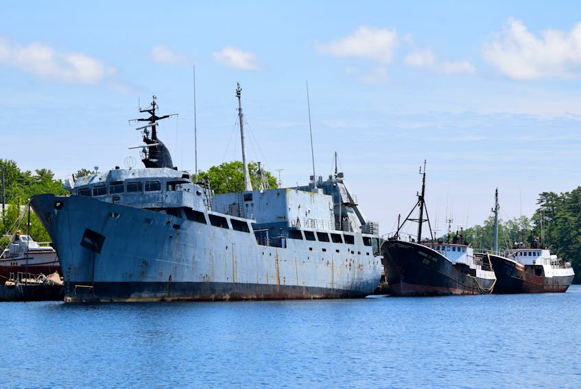 The former HMCS Cormorant sits moored at the Port of Bridgewater on the downtown waterfront. In addition to the Cormorant two other vessels are moored on the same jetty. “Both of these vessels are clearly not being maintained and their moorings are also in poor condition,” states a consultant’s report on the state of the Cormorant.